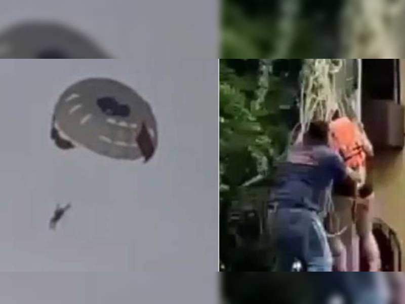 Turista aterriza en poste de luz al romperse su parachute en la playa