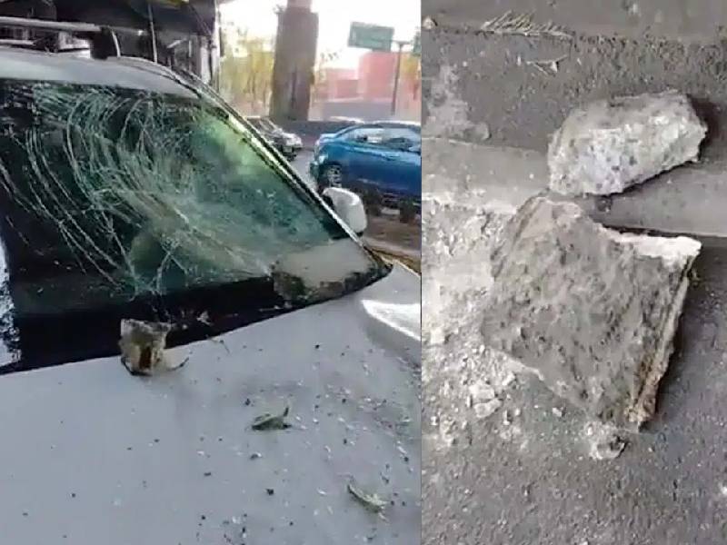 ¡Para sustito! Enorme piedra cae del segundo piso del Periférico y golpea camioneta