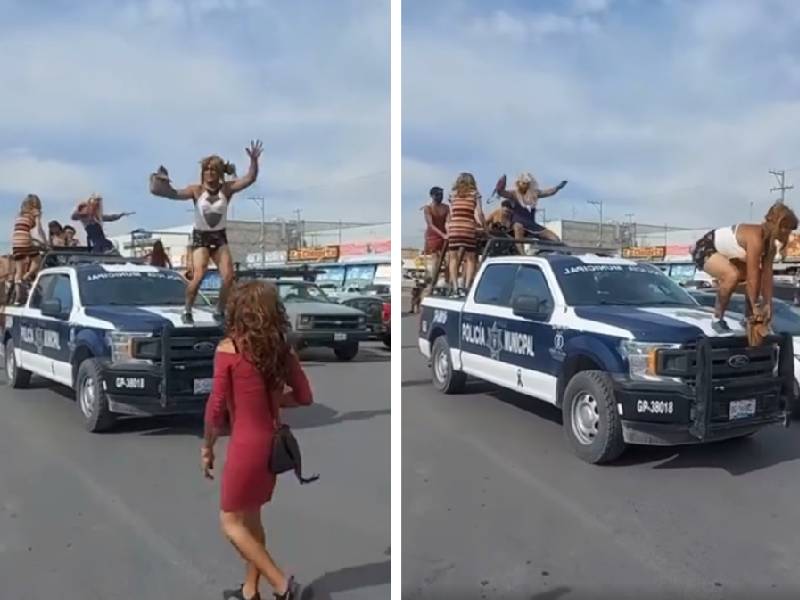 Video. Vestidos como mujeres, hombres perrean y bailan sobre patrulla