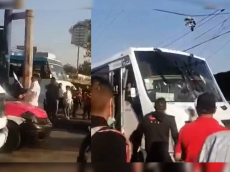 VIDEO: Con tubo, cadena y machete se enfrentan chófer y taxista
