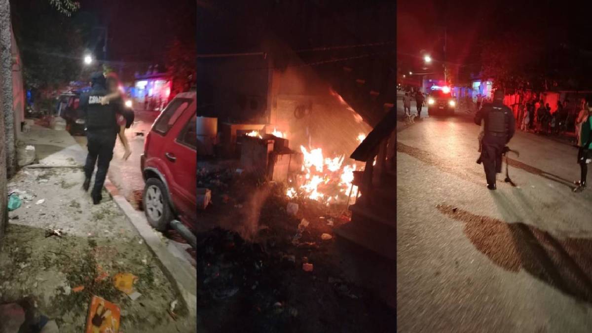 Aspecto del rescate de dos menores, en un incendio en la Sm 229 en Cancún.