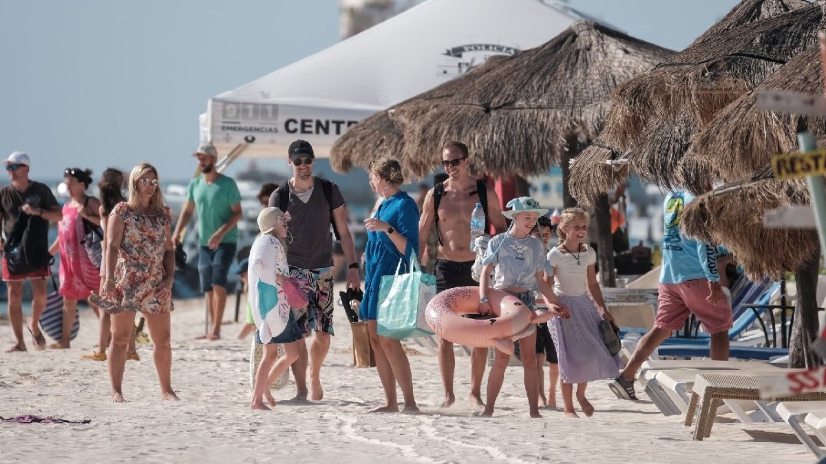 Turistas en Puerto Morelos.