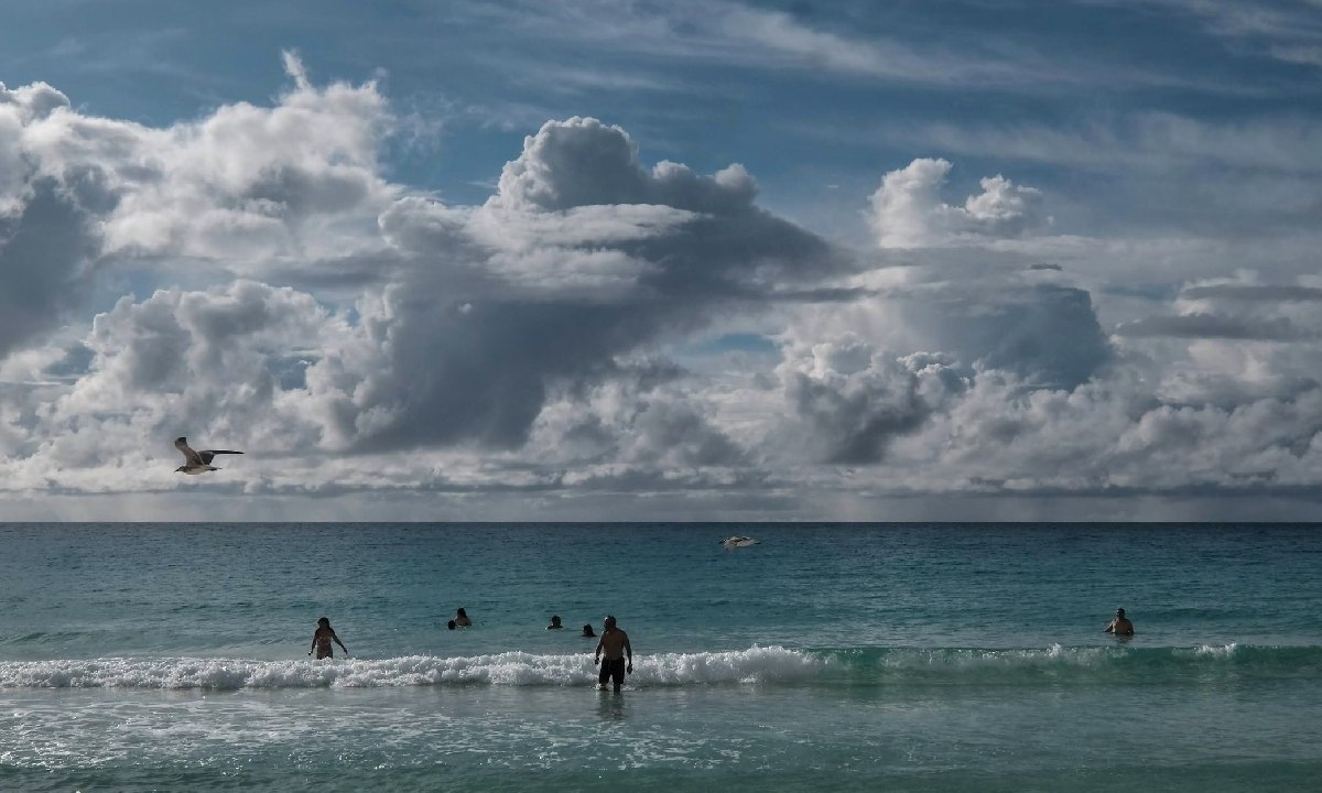 Bañistas en Cancún.