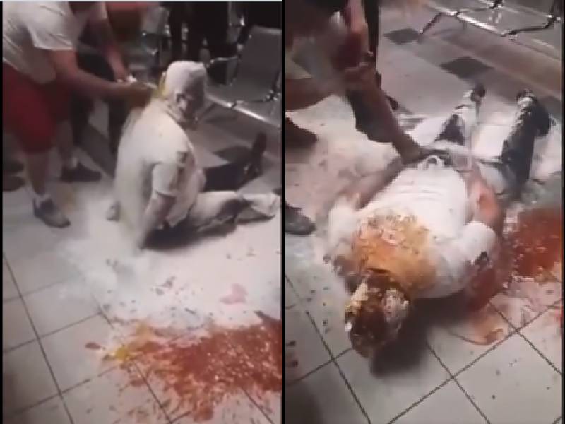 Video. Policías celebran a compañero y juegan al hombre pizza