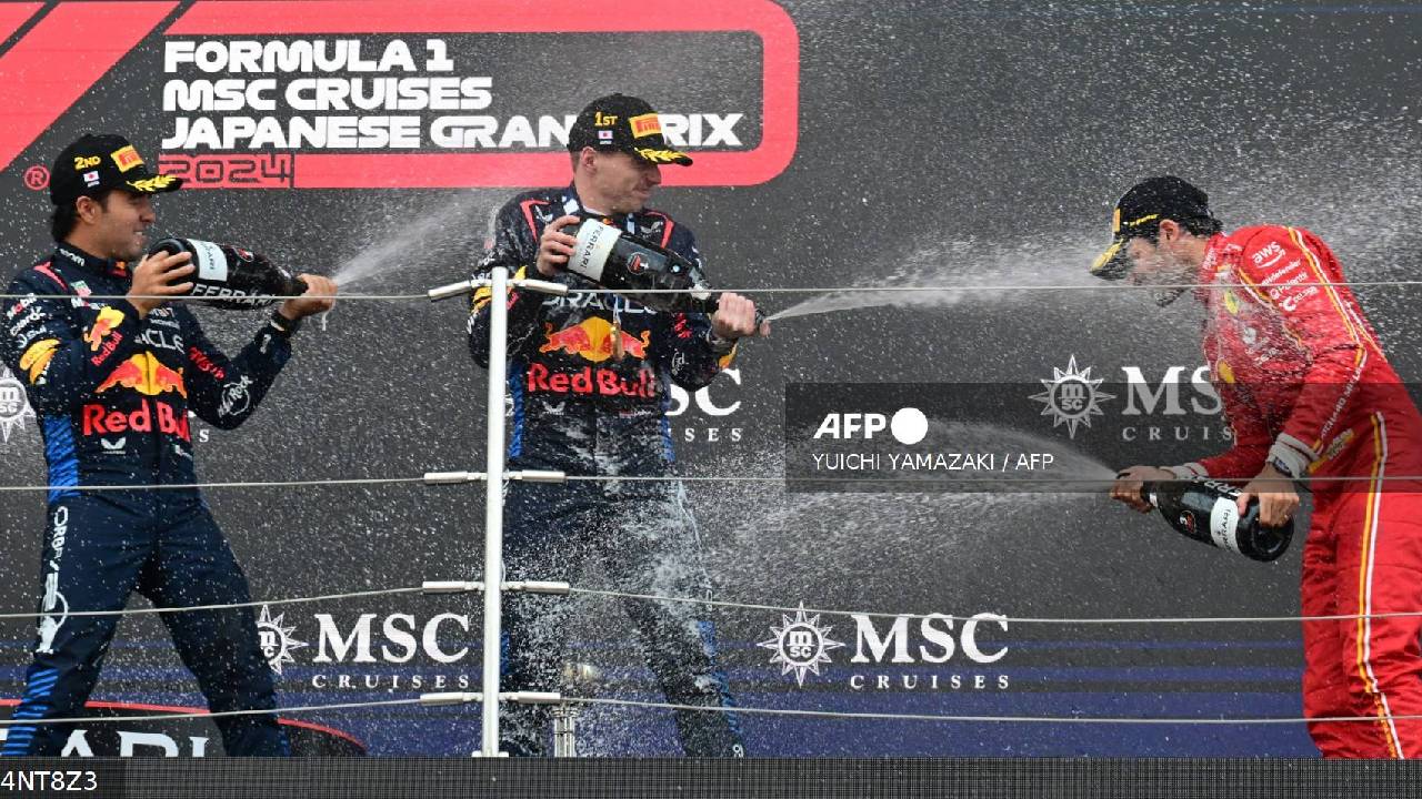 Celebración de los ganadores del Gran Premio de Japón, este domingo.